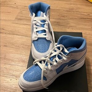 Nike Kids Sneakers Blue and White
Air Jordan Size 7Y
New with Original Box